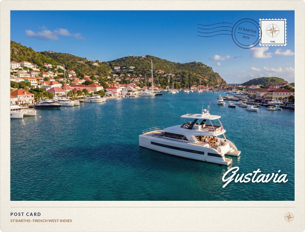 Postcard of a Motor Yacht in the harbor at Gustavia, St Barths, with red roofs above the quay