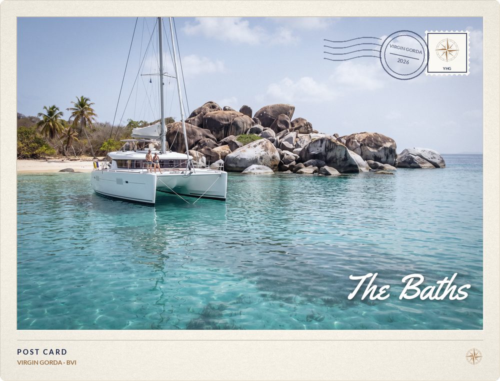 Postcard of a Sailing Catamaran anchored off the granite boulders of The Baths, Virgin Gorda